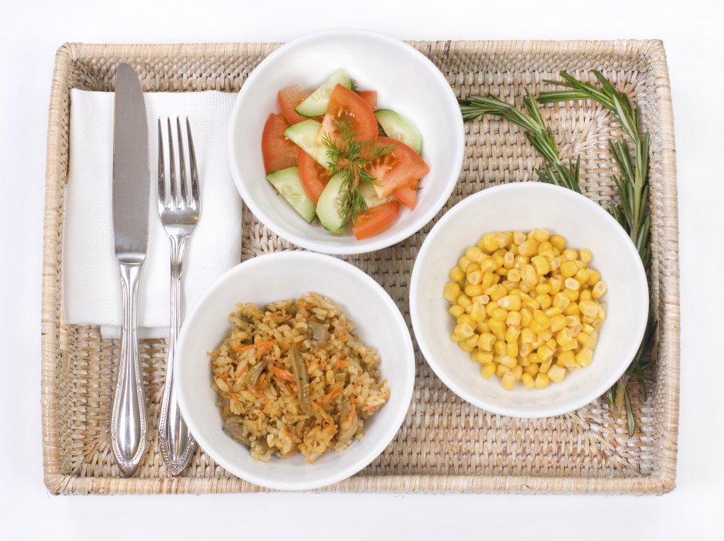 Three bowls with vegetarian dishes