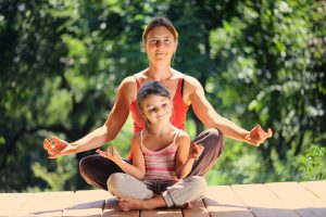 Grandmother and granddaughter at a morning gymnastics